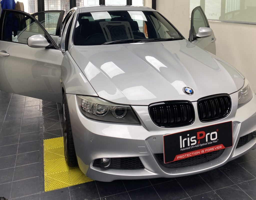 Beat the Heat, Protect Your Skin: Drive Cool BMW with Irispro's Tint.